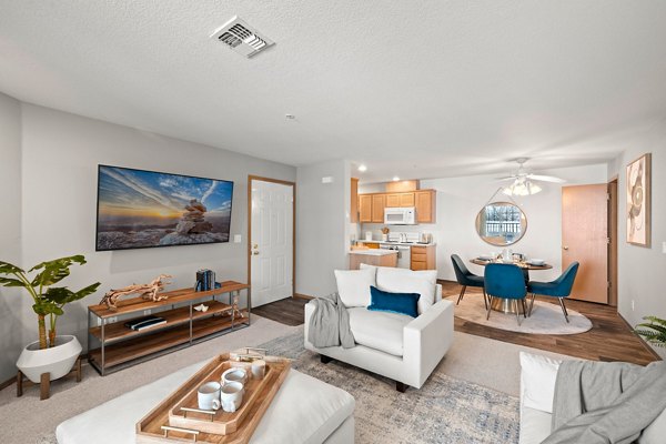 Spacious living room with modern decor in Highland Hills Apartments