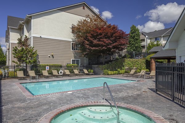 Rooftop pool with scenic views at Highland Hills Apartments