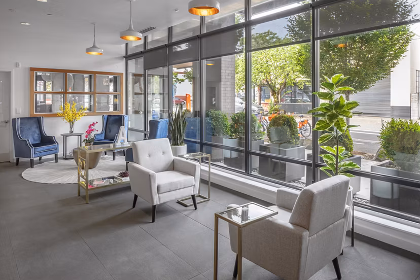 Modern clubhouse featuring stylish seating and decor at The Addy Apartments, a luxury living community in the heart of the city