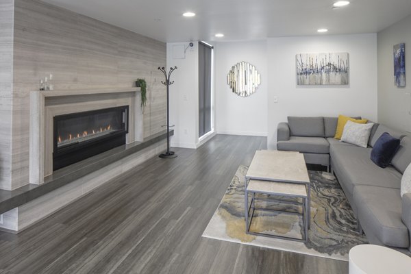 Modern clubhouse with inviting lounge areas at The Addy Apartments, featuring luxury amenities in a vibrant community setting