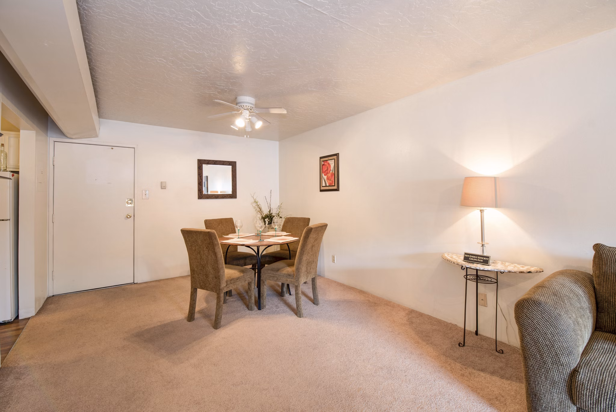 Dining room featuring elegant furnishings and contemporary decor at Desert Creek Apartments in a luxurious setting