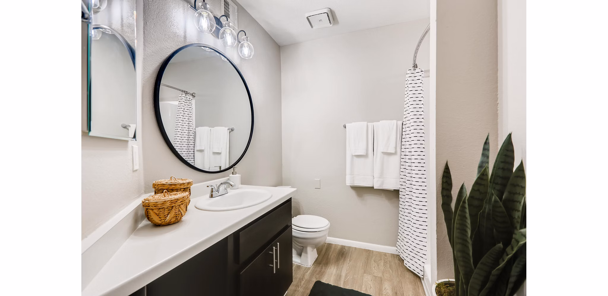 Modern bathroom with elegant fixtures in Genoa Lakes Apartments
