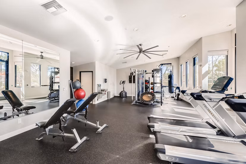 State-of-the-art fitness center with modern equipment at Genoa Lakes Apartments