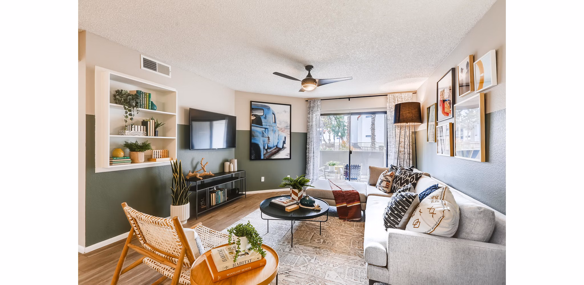 Spacious living room with modern decor at Genoa Lakes Apartments, showcasing luxury living spaces for a comfortable lifestyle