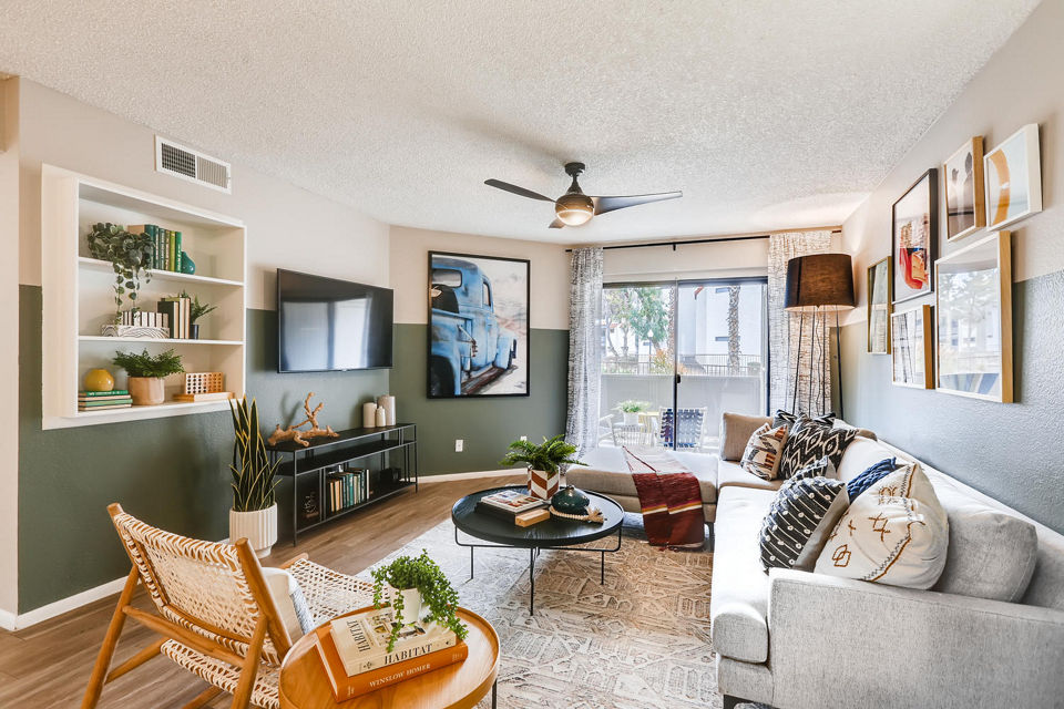 Spacious living room with modern decor at Genoa Lakes Apartments, showcasing luxury living spaces for a comfortable lifestyle