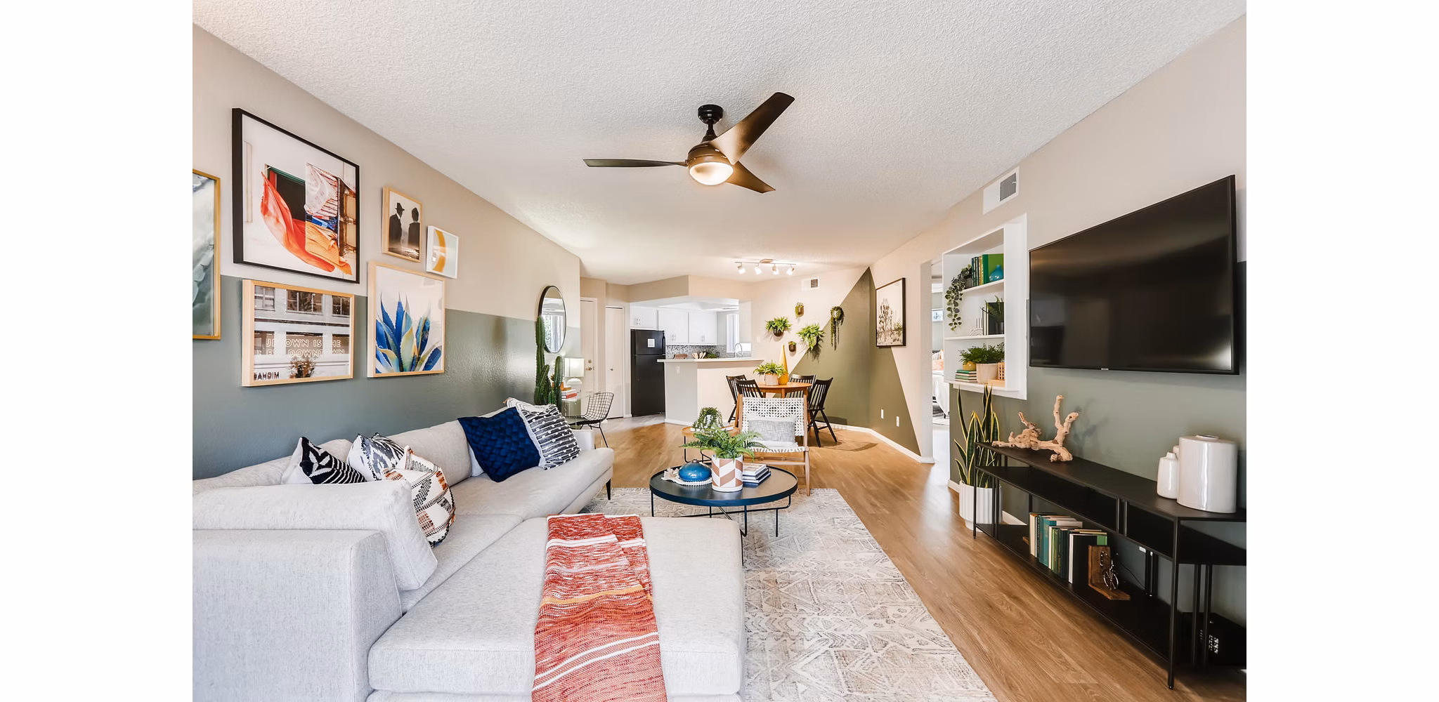 Spacious living room with modern decor at Genoa Lakes Apartments