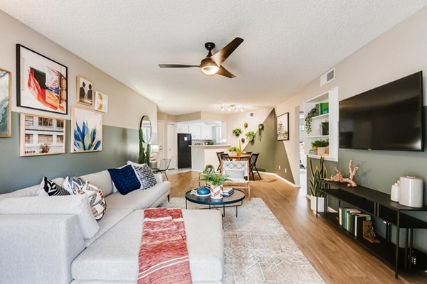 Spacious living room with modern decor at Genoa Lakes Apartments