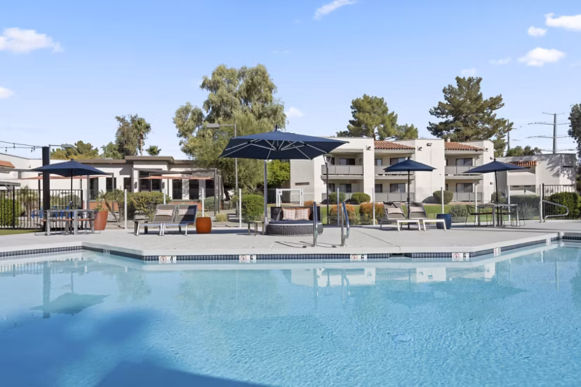 Refreshing poolside amenity at 1000 Genoa Lakes Apartments
