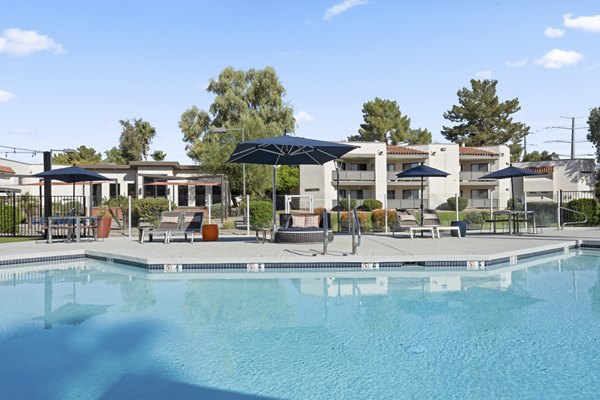 Refreshing poolside amenity at 1000 Genoa Lakes Apartments