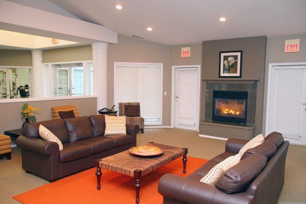 Community clubhouse at Jackson School Village Apartments featuring modern amenities and seating areas