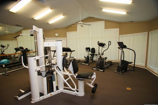 fitness center at Jackson School Village Apartments