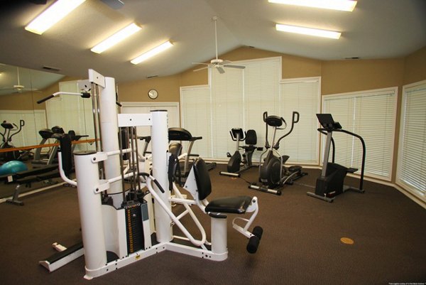 State-of-the-art fitness center with modern equipment at Jackson School Village Apartments