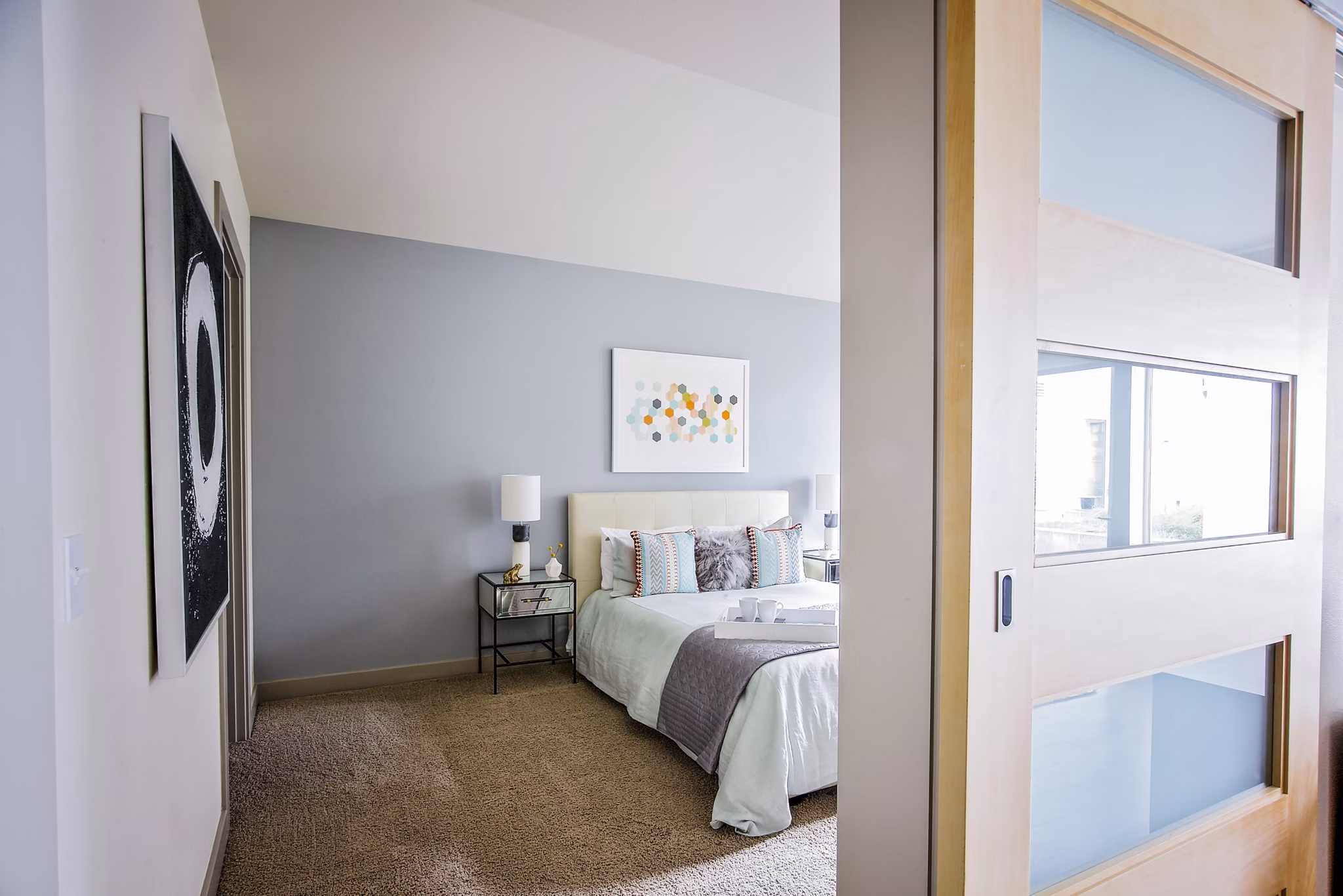 Luxurious bedroom with stylish decor at Enso Apartments, ideal for modern living in a premium Greystar luxury apartment community
