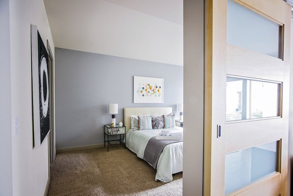 Luxurious bedroom with stylish decor at Enso Apartments, ideal for modern living in a premium Greystar luxury apartment community