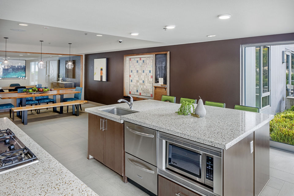 Modern clubhouse lobby with elegant seating and contemporary decor at Enso Apartments