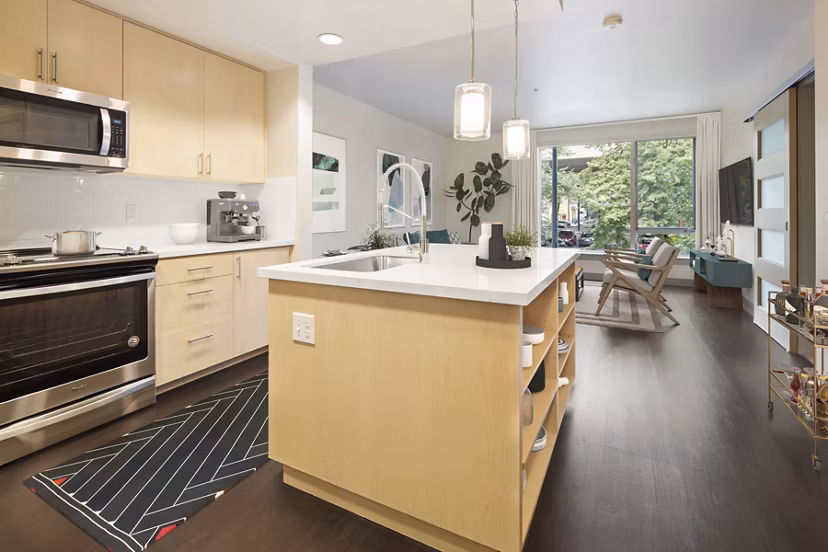 Contemporary kitchen with modern appliances at Enso Apartments
