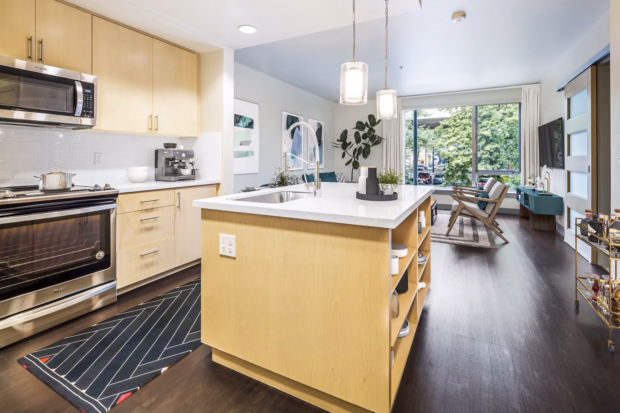 Contemporary kitchen with modern appliances at Enso Apartments