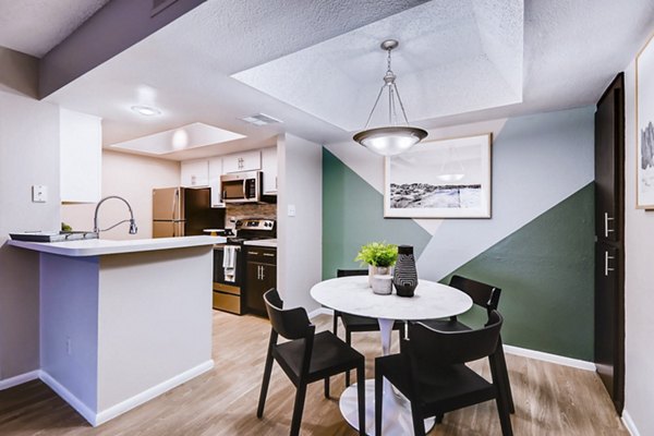 Dining room with elegant lighting and modern decor at Rockledge Fairways Apartments