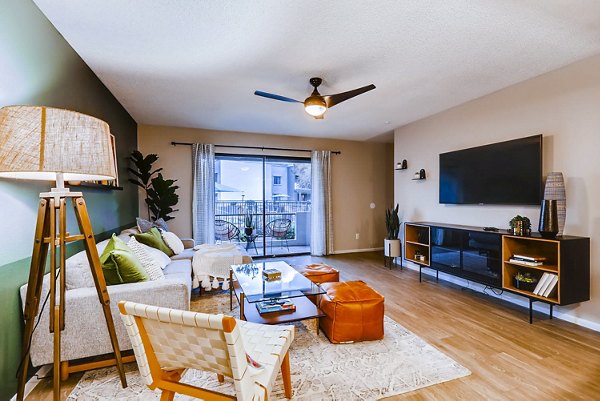 Spacious living room with modern decor at Rockledge Fairways Apartments, luxury living by Greystar