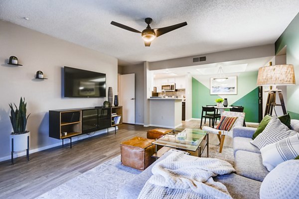 Cozy living room with plush sofas and stylish decor in Rockledge Fairways Apartments