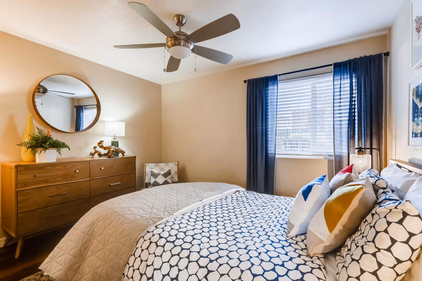 Cozy bedroom with modern furnishings at Scottsdale Gateway Apartments