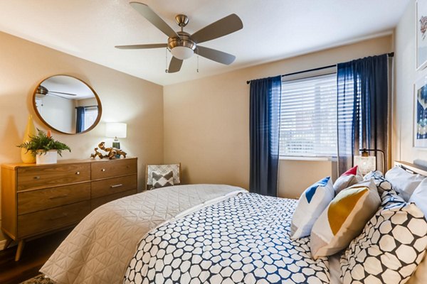 Cozy bedroom with modern furnishings at Scottsdale Gateway Apartments
