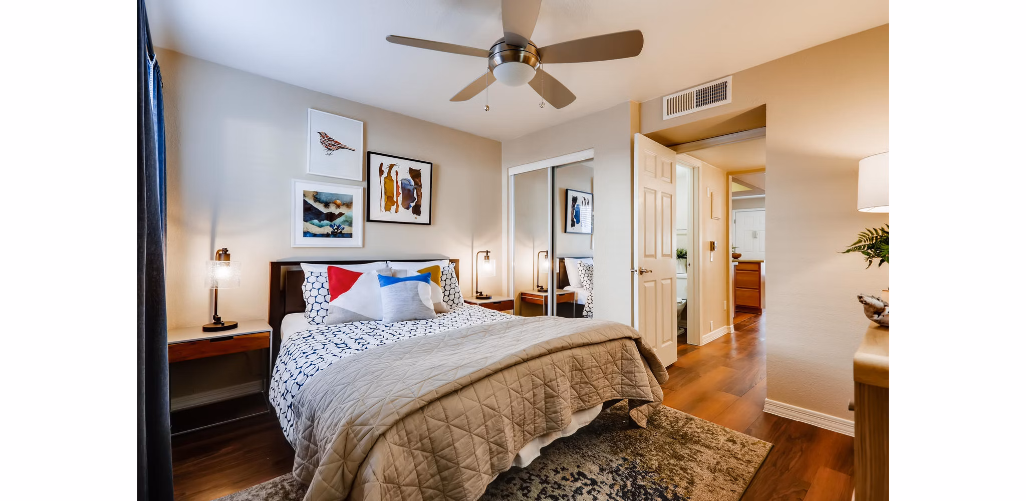 Stylish bedroom with modern decor at Scottsdale Gateway Apartments, offering luxury living in a prime Scottsdale location