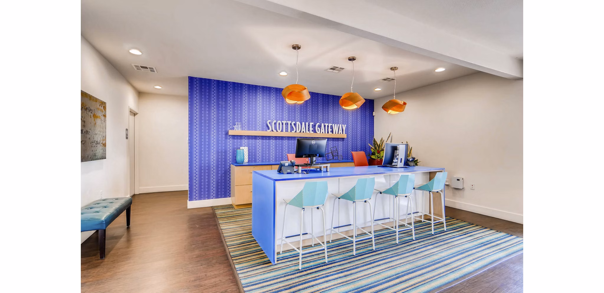 Clubhouse featuring modern design and spacious seating at Scottsdale Gateway Apartments, ideal for gatherings and relaxation