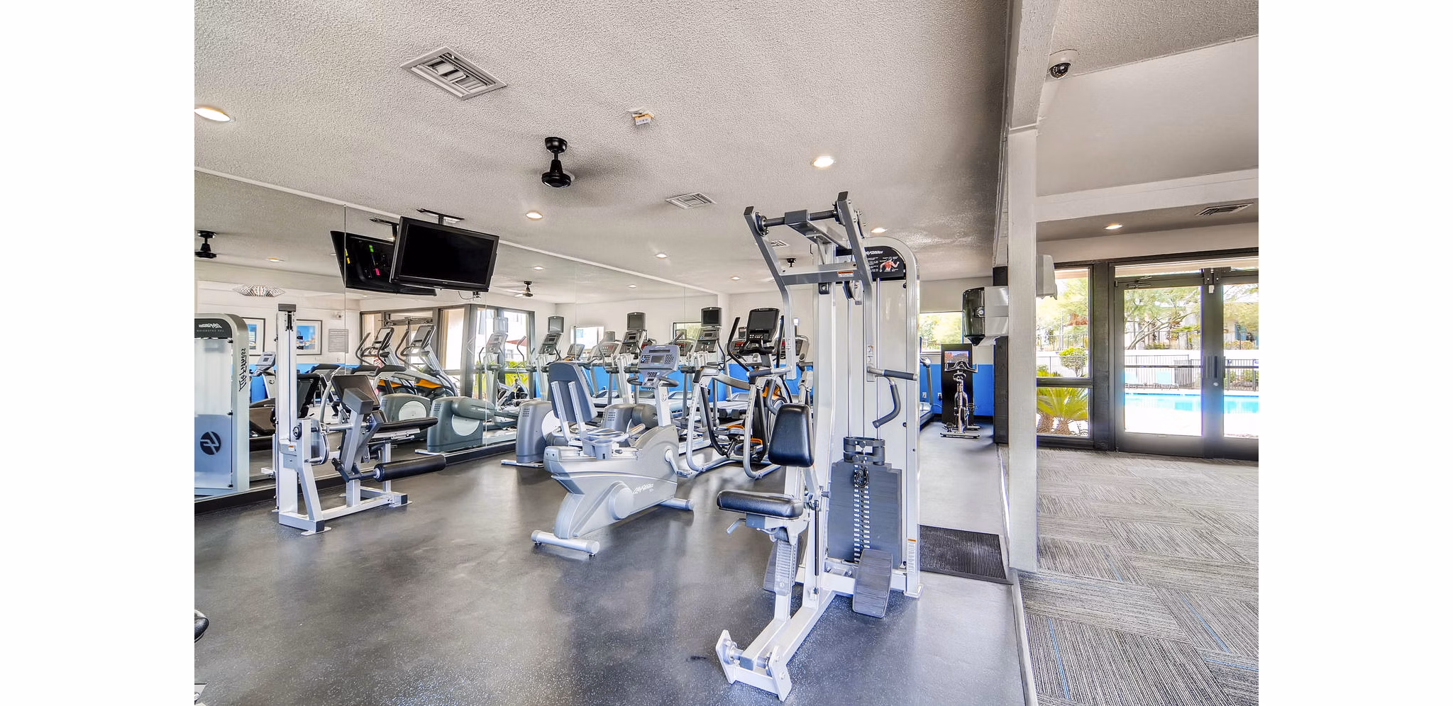 Modern fitness center with state-of-the-art equipment at Scottsdale Gateway Apartments for an active lifestyle
