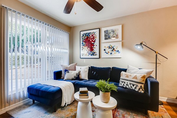 Living room with cozy seating and modern decor at Scottsdale Gateway Apartments