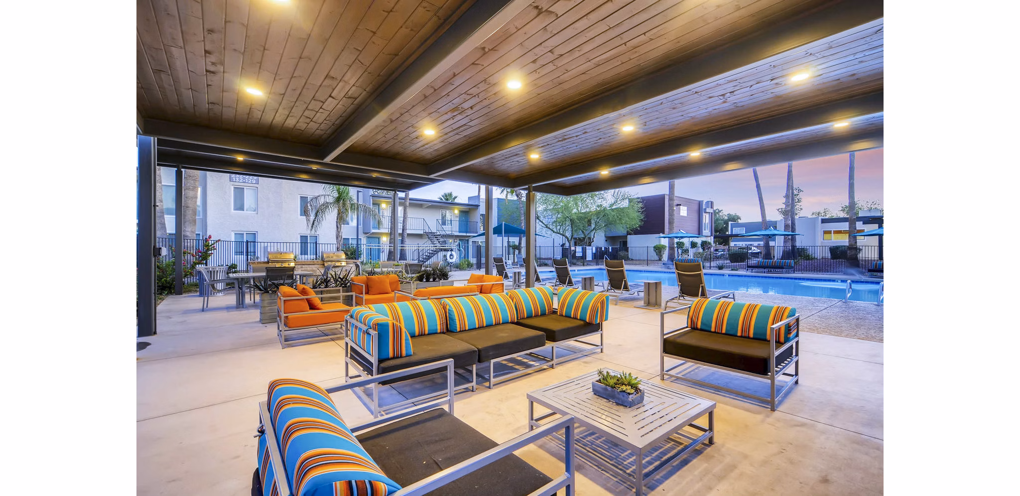 Scenic patio with outdoor seating at Scottsdale Gateway Apartments, ideal for relaxing and enjoying views in stylish Greystar luxury apartments