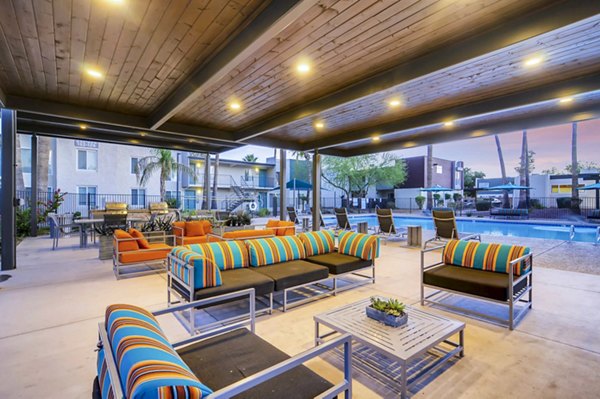 Scenic patio with outdoor seating at Scottsdale Gateway Apartments, ideal for relaxing and enjoying views in stylish Greystar luxury apartments