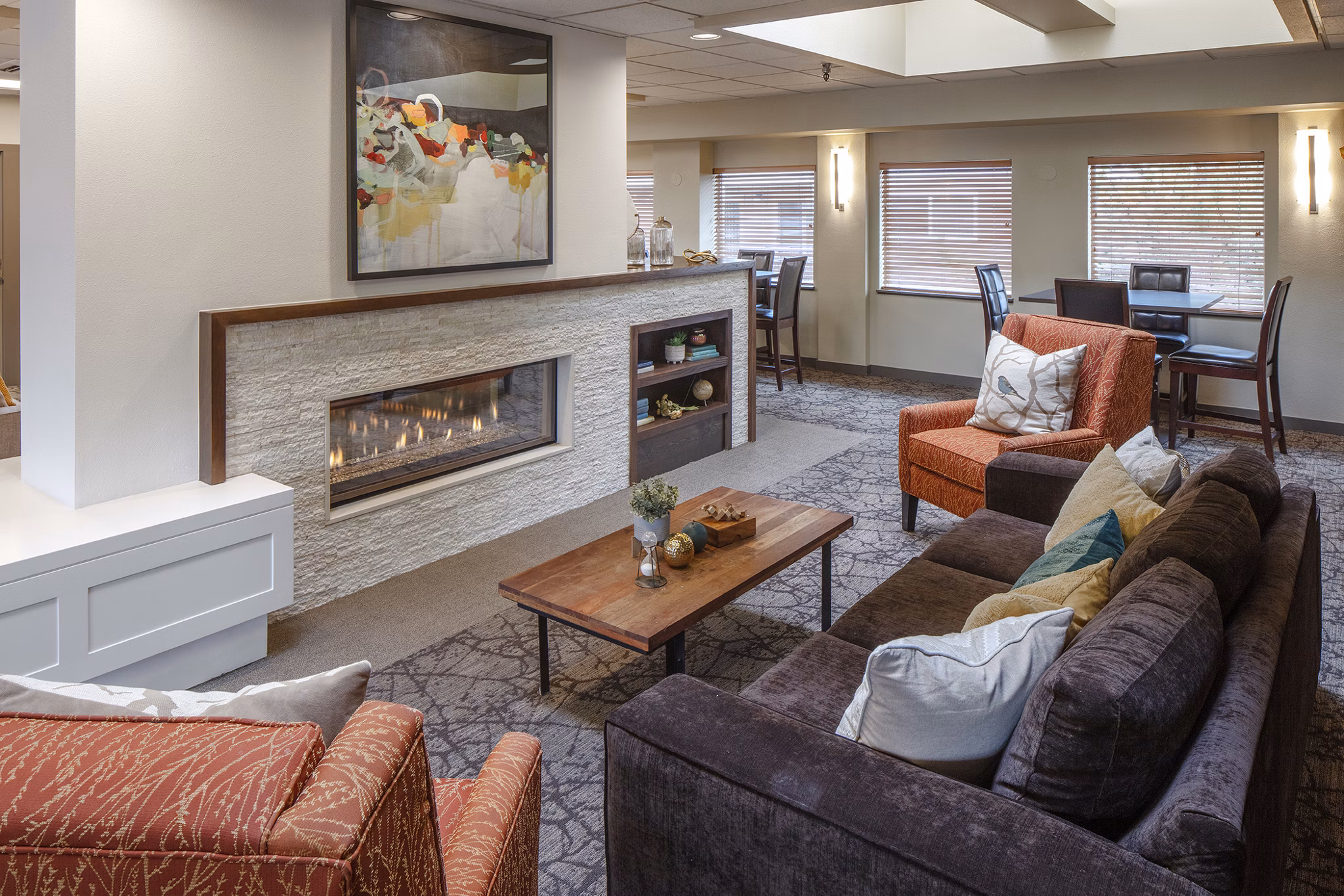 Clubhouse featuring modern design and lounge seating at Canyon Park Apartments
