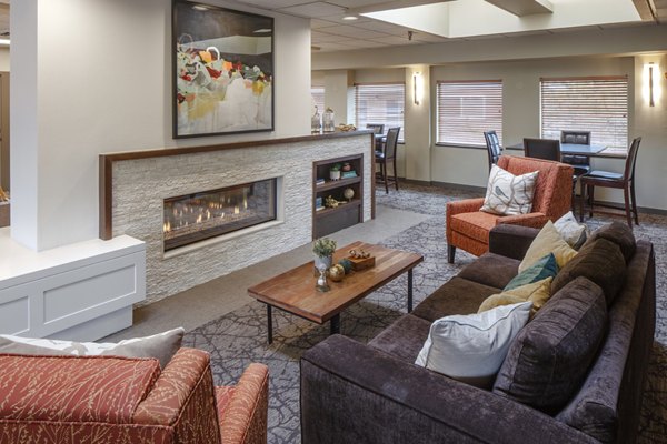 Clubhouse featuring modern design and lounge seating at Canyon Park Apartments