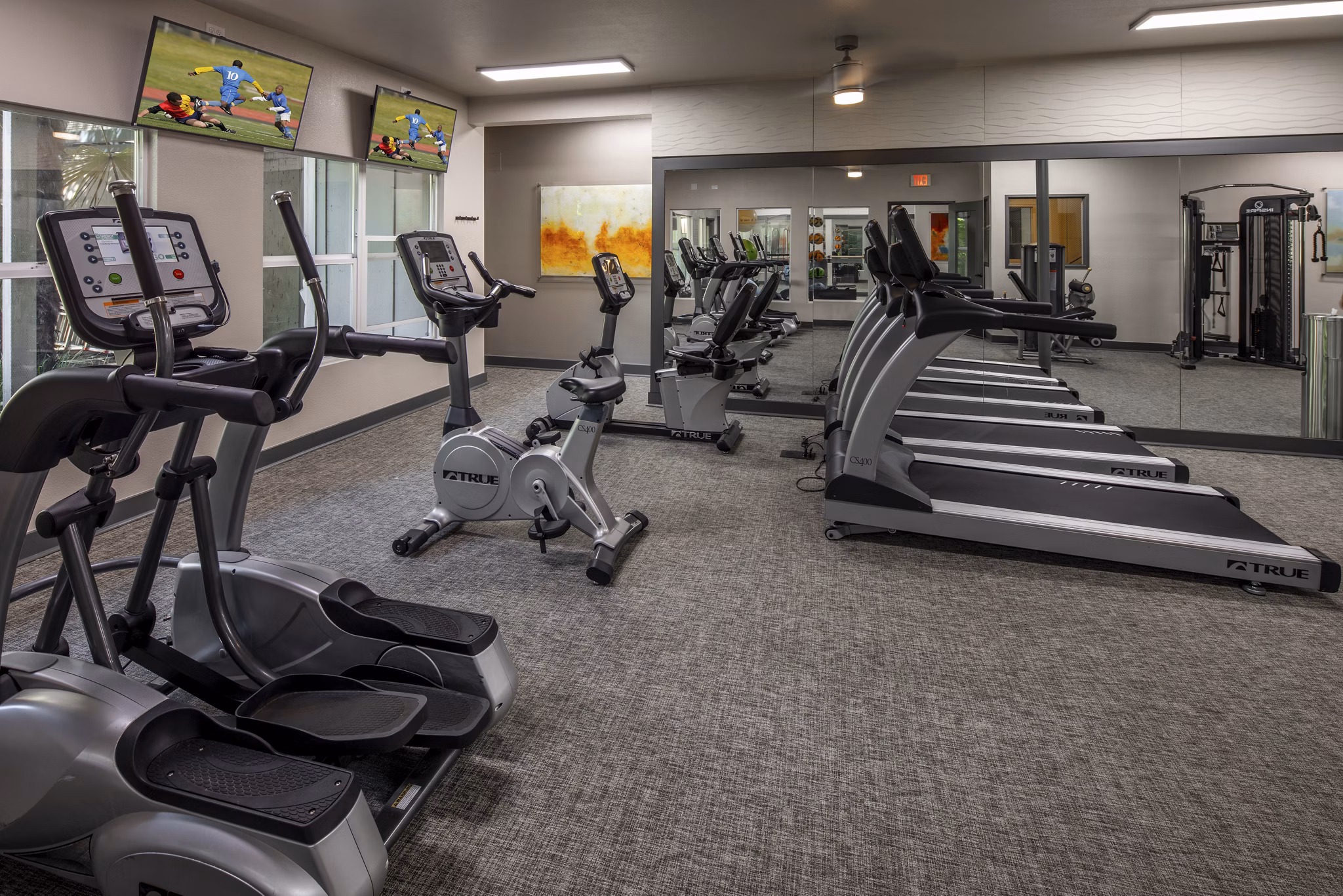 fitness center at Canyon Park Apartments