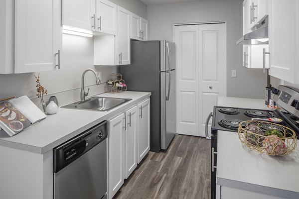 Modern kitchen with stainless steel appliances at Canyon Park Apartments