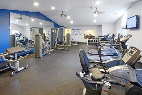 State-of-the-art fitness center with modern equipment at Landmark at Tanasbourne Apartments in Portland