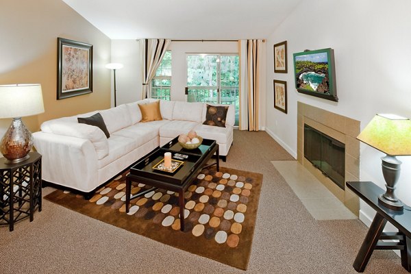 Spacious living room with modern decor in Landmark at Tanasbourne Apartments