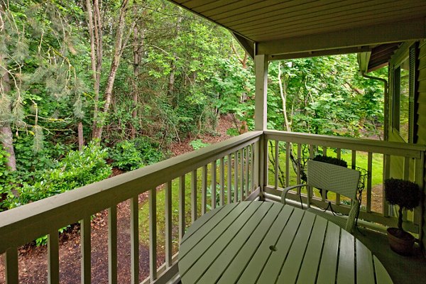 Spacious patio with modern furniture at Landmark at Tanasbourne Apartments, perfect for outdoor relaxation and entertaining