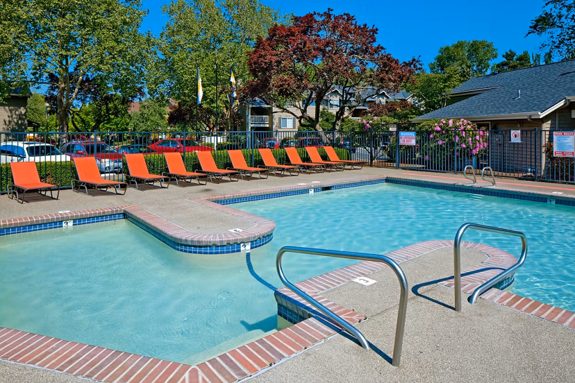 Resort-style pool at Landmark at Tanasbourne Apartments offering luxurious leisure in a serene setting