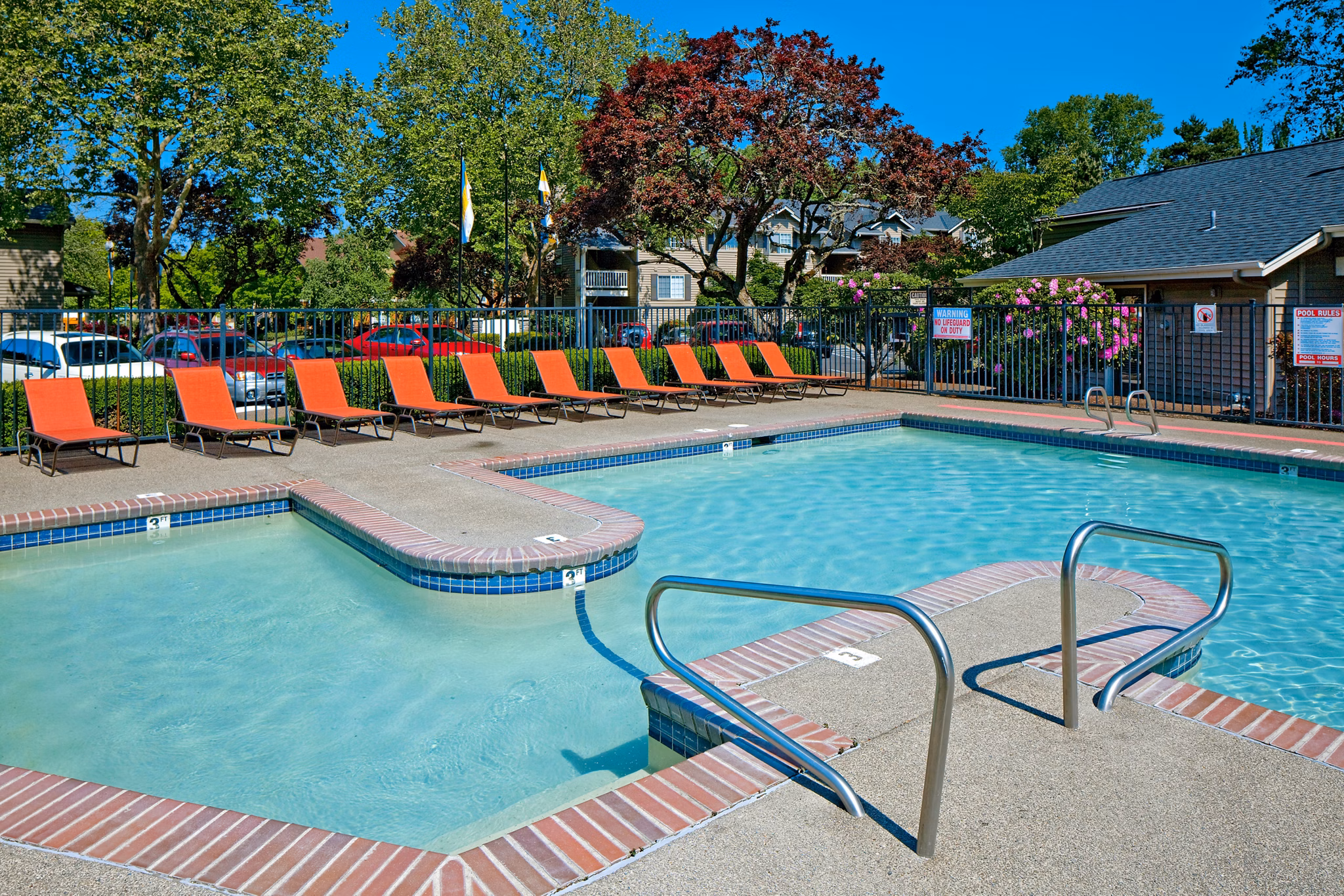 Resort-style pool at Landmark at Tanasbourne Apartments offering luxurious leisure in a serene setting