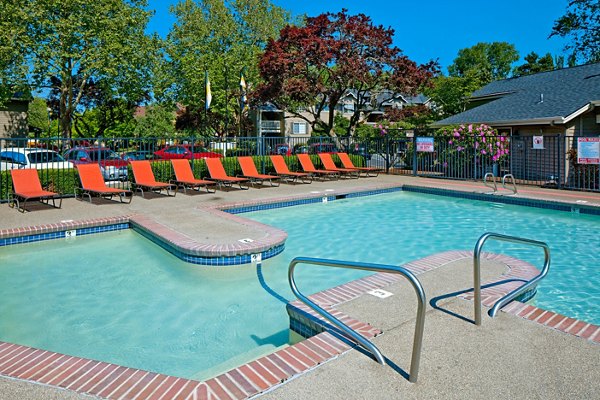 Resort-style pool at Landmark at Tanasbourne Apartments offering luxurious leisure in a serene setting