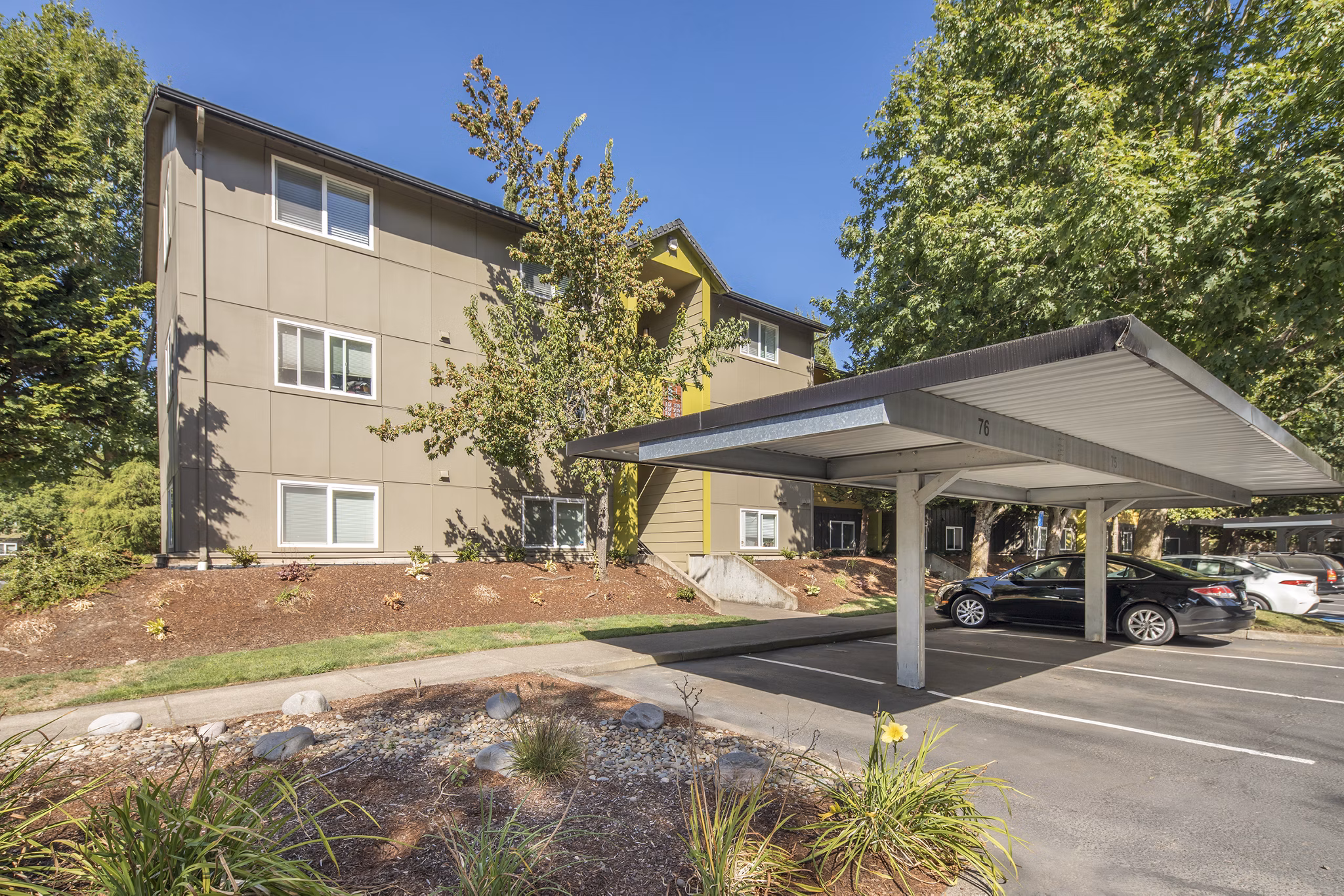 Crescent Park Apartments: Secure covered parking facility for residents in a modern setting