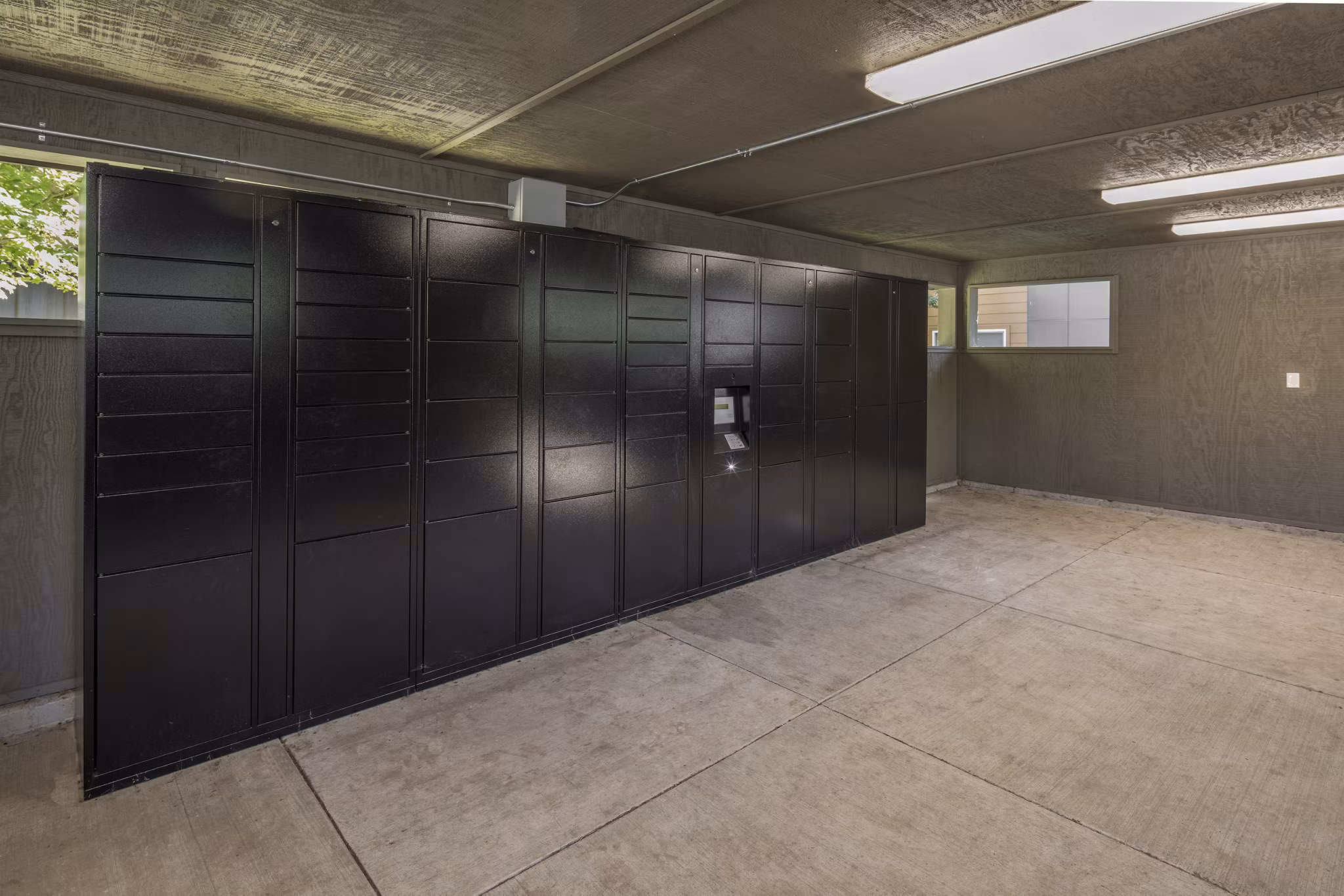 Mailroom with parcel lockers at Crescent Park Apartments, Greystar luxury apartments in Houston