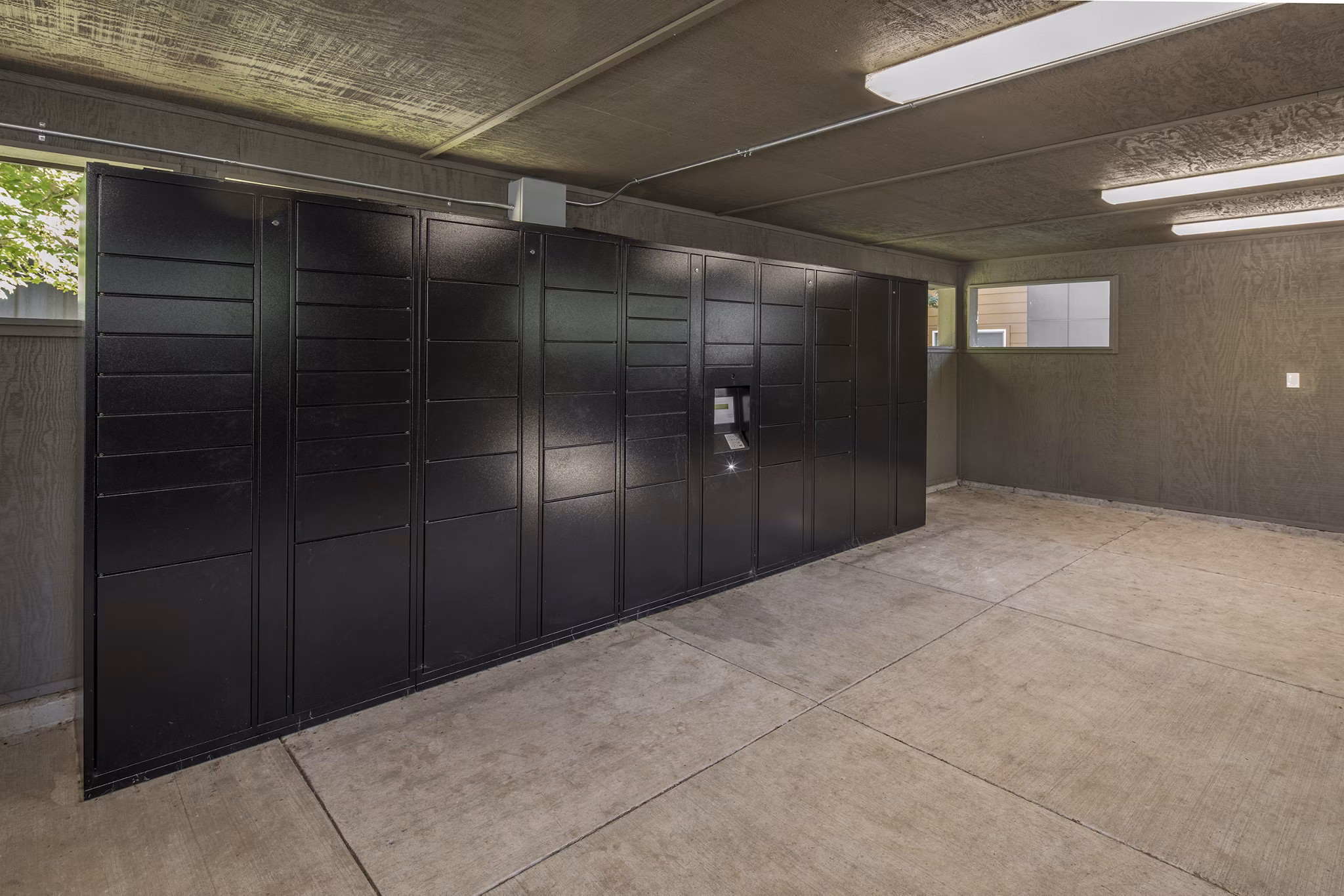 Mailroom with parcel lockers at Crescent Park Apartments, Greystar luxury apartments in Houston