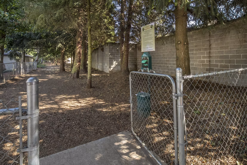 Crescent Park Apartments: Spacious dog park featuring agility course for pet-friendly living