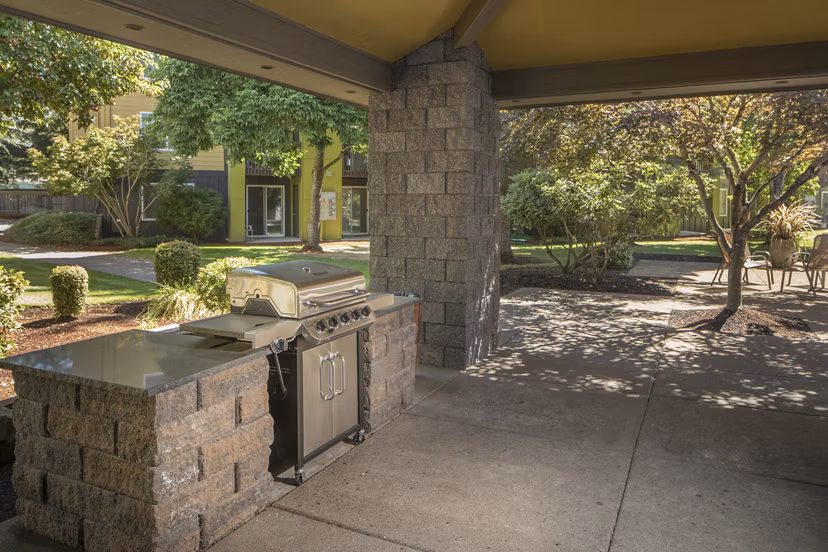 Grill area with modern countertops at Crescent Park Apartments