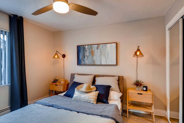 Spacious bedroom with stylish decor at Park Plaza Apartments, a luxury living option by Greystar