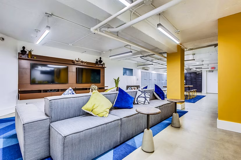 Clubhouse and lobby area featuring modern design and seating at Park Plaza Apartments