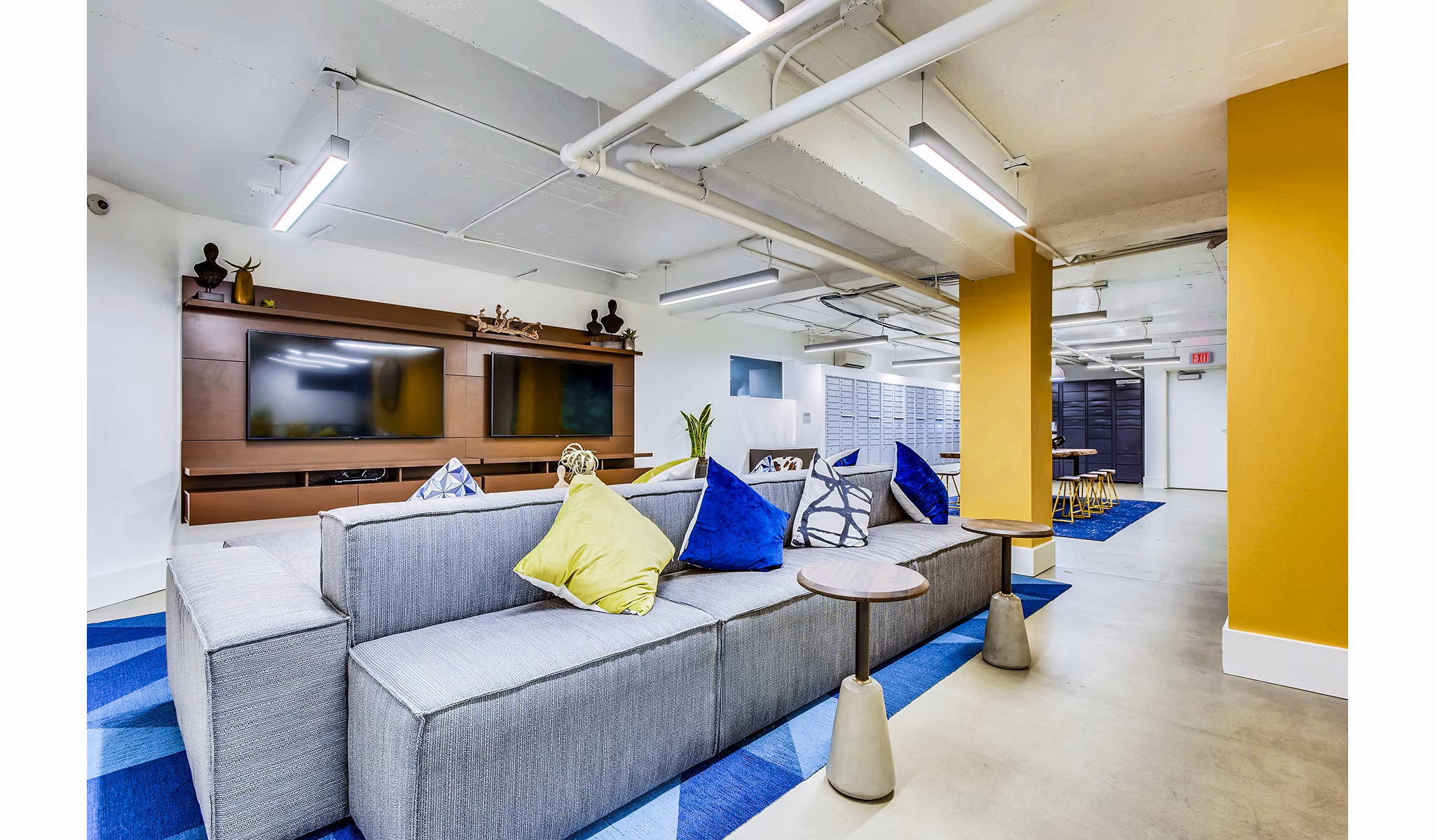 Clubhouse and lobby area featuring modern design and seating at Park Plaza Apartments